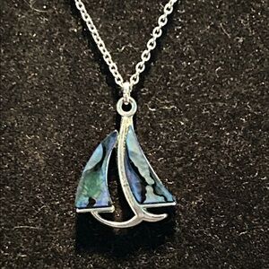 Necklace. Abalone Shell Sailboat necklace on Silver Tone Base